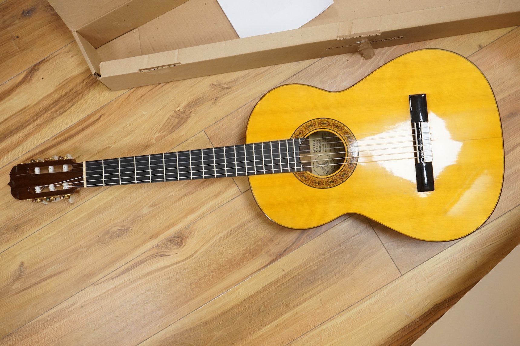 A Ricardo Quiles classical guitar, a Ramirez copy, with spruce top, Indian rosewood back and sides and ebony fingerboard.